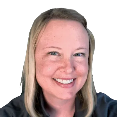 Carie's headshot (with a friendly smile)
